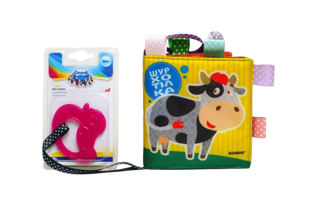 Обкладника "Мʼяка книжка з брязкальцем «Корівка»" Обкладинка "Мʼяка книжка з брязкальцем «Корівка»"